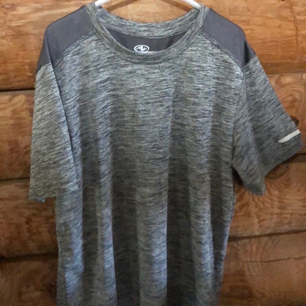 Size large 10/12 heather gray athletic shirt.